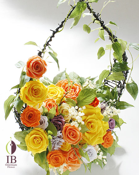 米寿の贈り物 黄色とオレンジミックスアレンジ